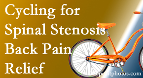 Dr. Hoang's Chiropractic Clinic encourages exercise like cycling for back pain relief from lumbar spine stenosis.